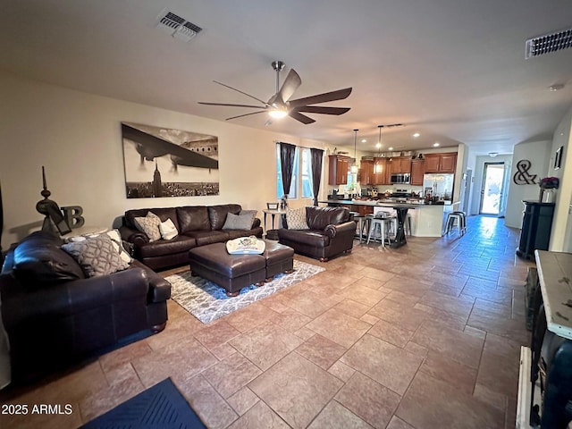 living room featuring ceiling fan