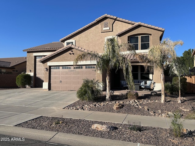 view of front of home with a garage