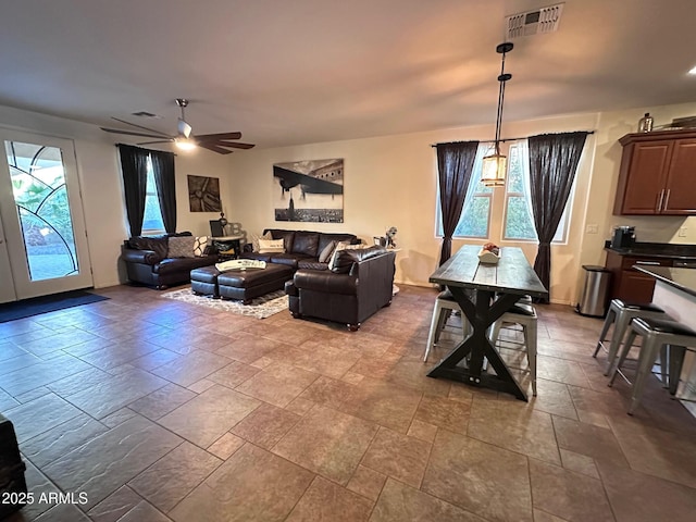 living room featuring ceiling fan