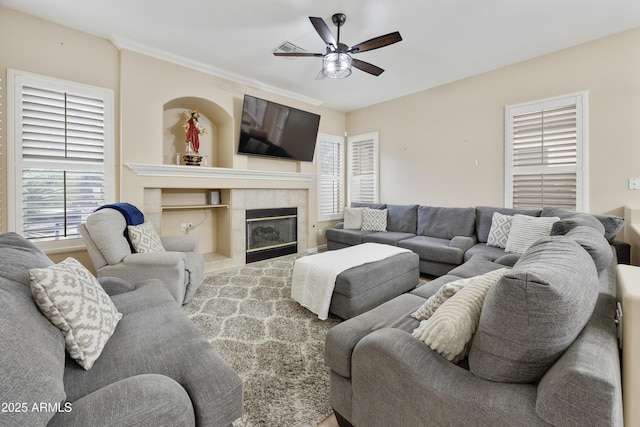 7262 W Firebird Dr, Glendale, AZ 85308 - living area with ceiling fan and a tile fireplace