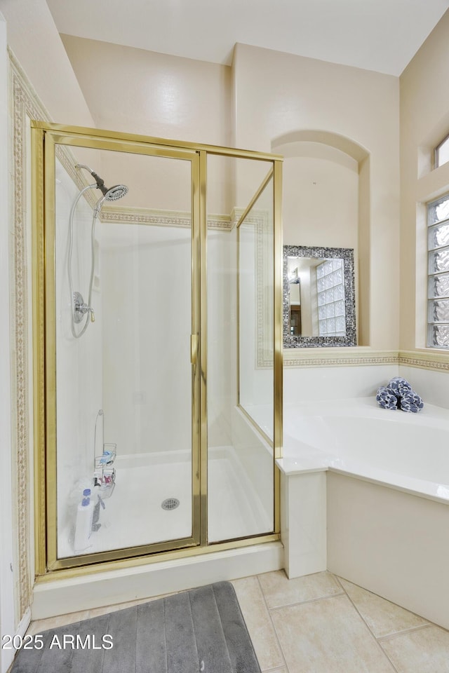 7262 W Firebird Dr, Glendale, AZ 85308 - bathroom featuring a shower stall, a bath, and tile patterned floors