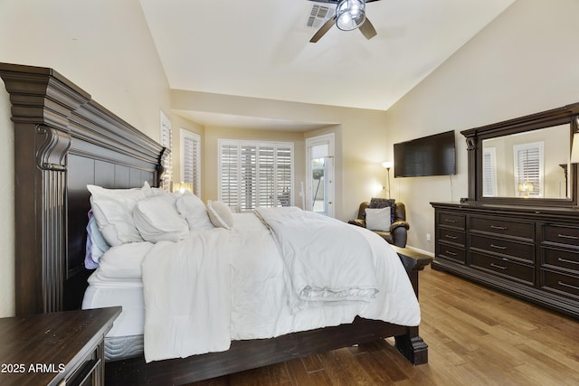7262 W Firebird Dr, Glendale, AZ 85308 - bedroom with lofted ceiling, wood finished floors, a ceiling fan, and baseboards