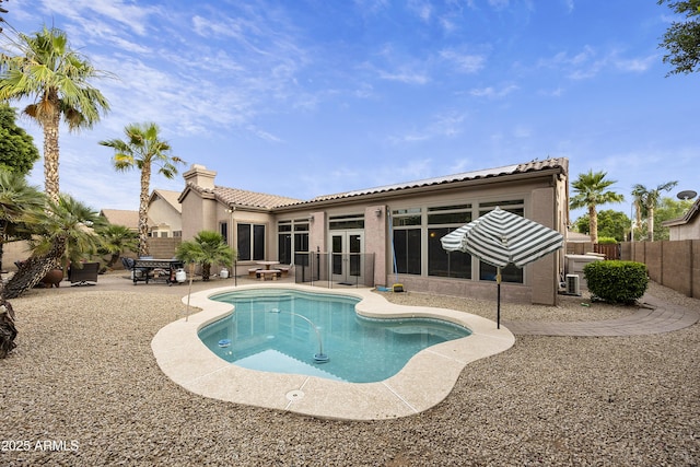 7262 W Firebird Dr, Glendale, AZ 85308 - back of property featuring a tile roof, a patio area, french doors, a fenced backyard, and stucco siding