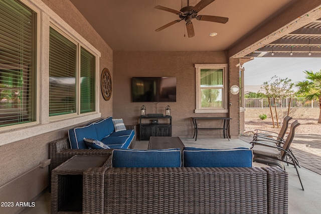 view of patio with ceiling fan and an outdoor hangout area