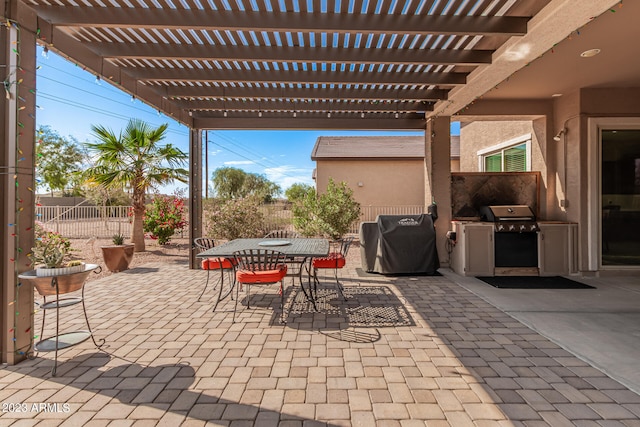 view of terrace featuring a pergola and grilling area