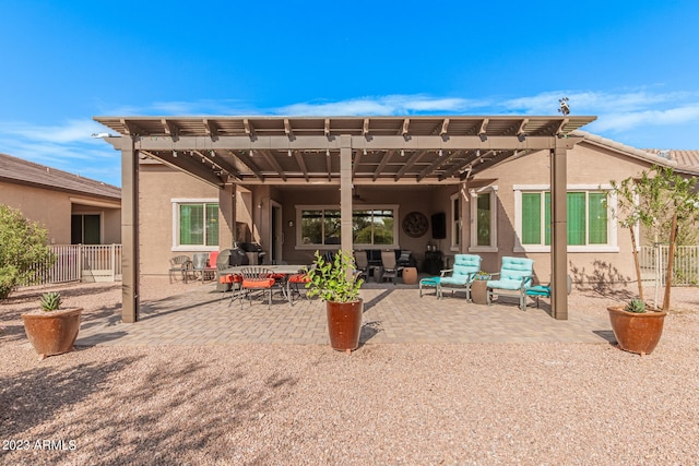 back of property featuring a patio area