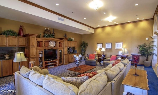 living room featuring crown molding and dark colored carpet