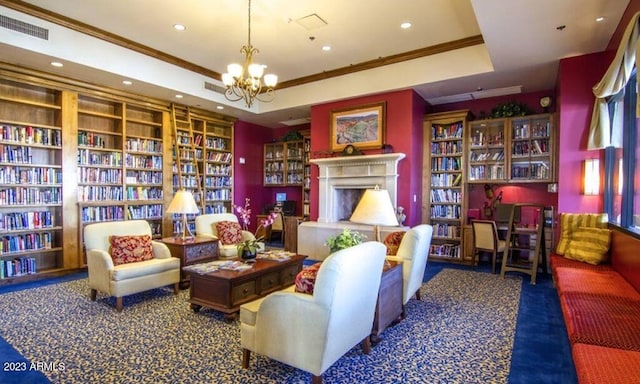 living area with a raised ceiling, dark carpet, crown molding, and a chandelier