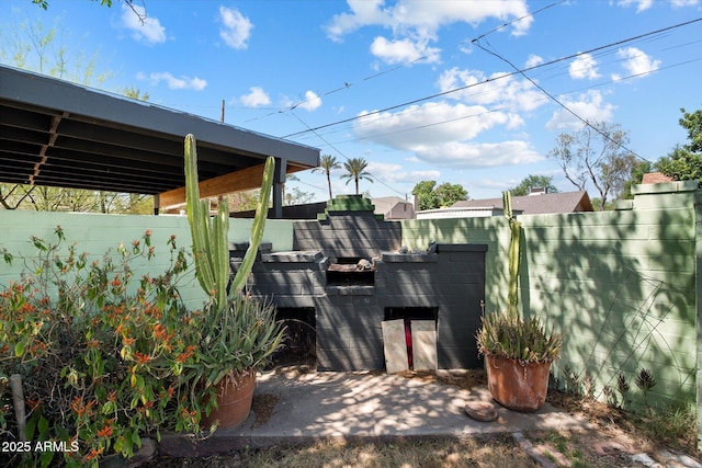 2230 N 12th St Rear, Rear, Phoenix, AZ 85006 - fenced backyard with a patio area