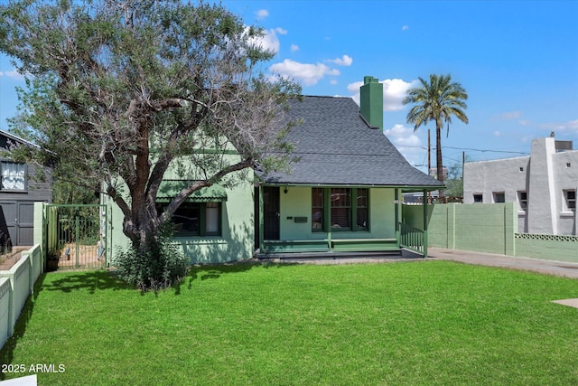 2230 N 12th St Rear, Rear, Phoenix, AZ 85006 - back of property featuring covered porch, roof with shingles, a chimney, and a gate