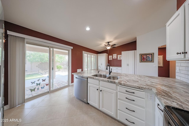10371 W Pontiac Dr, Peoria, AZ 85382 - kitchen featuring dishwasher, a sink, range with electric cooktop, vaulted ceiling, and light stone counters