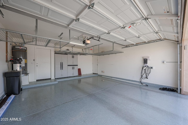 10371 W Pontiac Dr, Peoria, AZ 85382 - garage with a garage door opener and baseboards