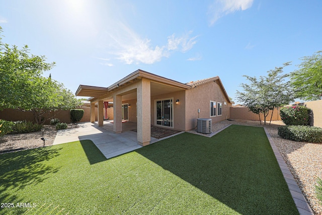 10371 W Pontiac Dr, Peoria, AZ 85382 - back of house with stucco siding, a patio area, and cooling unit