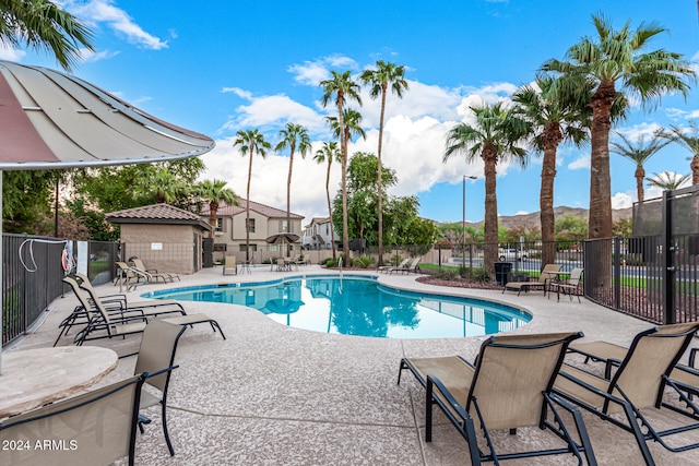 view of pool featuring a patio area