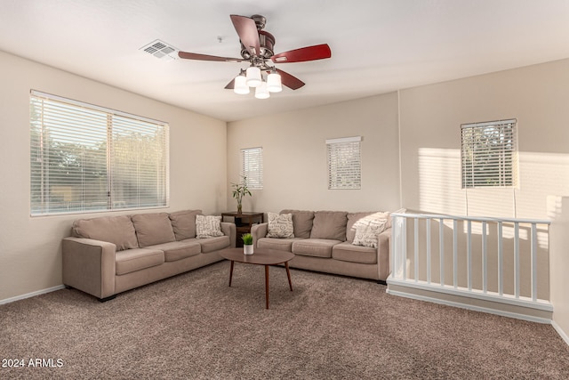 living room with carpet flooring and ceiling fan