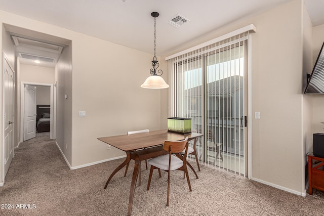 view of carpeted dining room