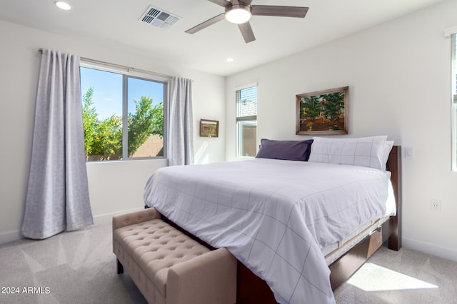 carpeted bedroom featuring ceiling fan