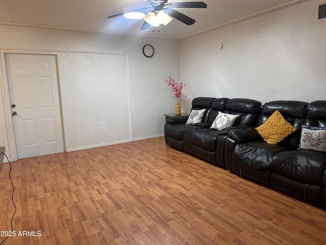2115 W Myrtle Ave, Phoenix, AZ 85021 - living area featuring light wood-style floors, ceiling fan, and baseboards