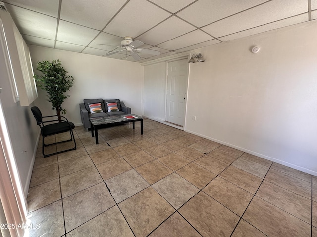 2115 W Myrtle Ave, Phoenix, AZ 85021 - sitting room featuring a drop ceiling, ceiling fan, light tile patterned floors, and baseboards