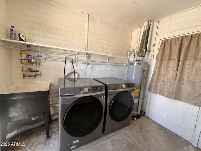 2115 W Myrtle Ave, Phoenix, AZ 85021 - laundry area with gas water heater, concrete block wall, and separate washer and dryer
