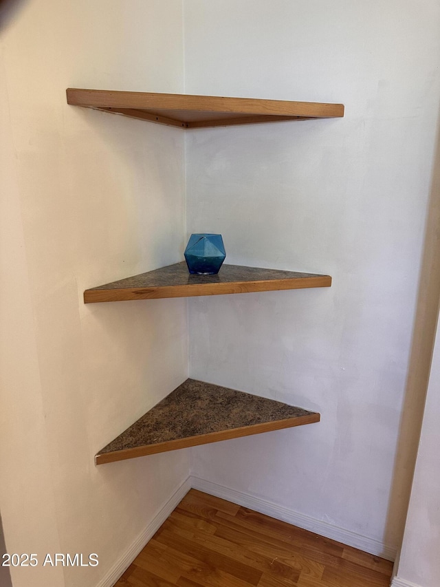 2115 W Myrtle Ave, Phoenix, AZ 85021 - detailed view of wood finished floors and baseboards
