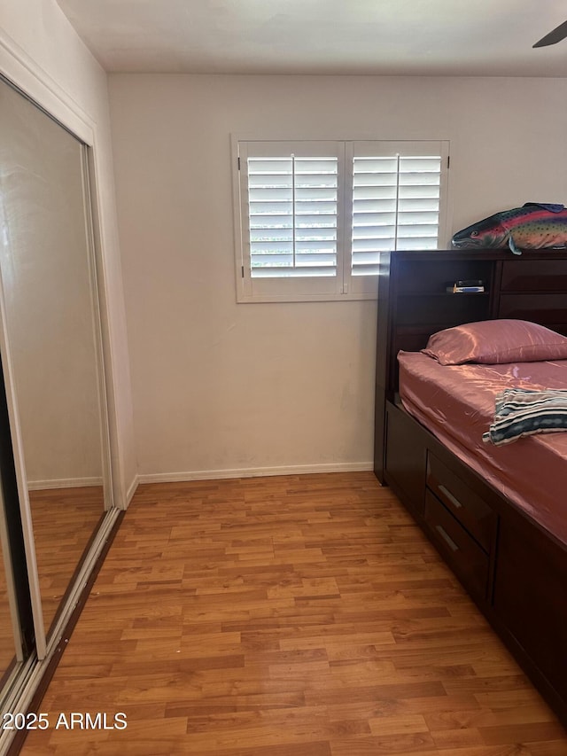 2115 W Myrtle Ave, Phoenix, AZ 85021 - bedroom featuring light wood finished floors and baseboards