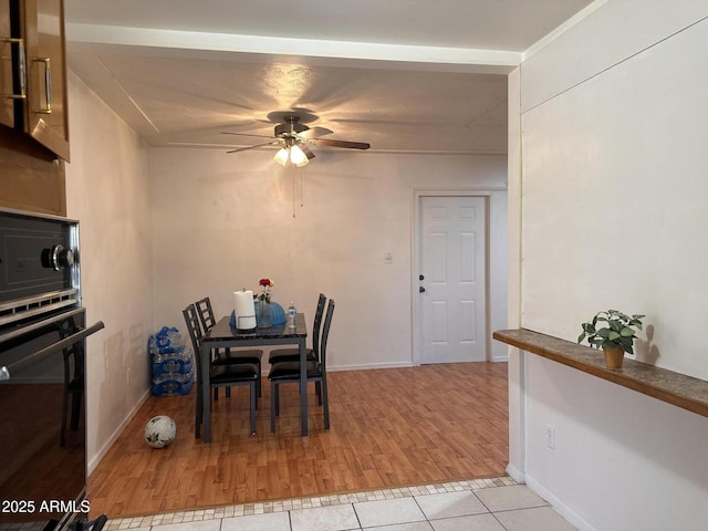 2115 W Myrtle Ave, Phoenix, AZ 85021 - dining area with ceiling fan, light tile patterned floors, and baseboards