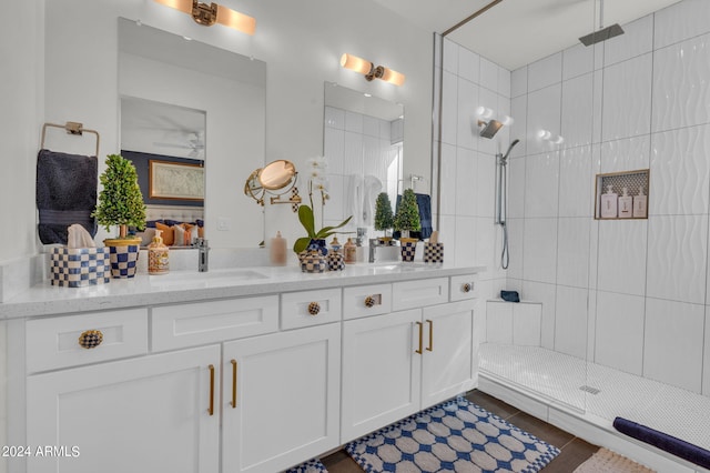 5151 N 13th Pl Unit 4, Phoenix, AZ 85014 - full bathroom featuring double vanity, a tile shower, and tile patterned floors