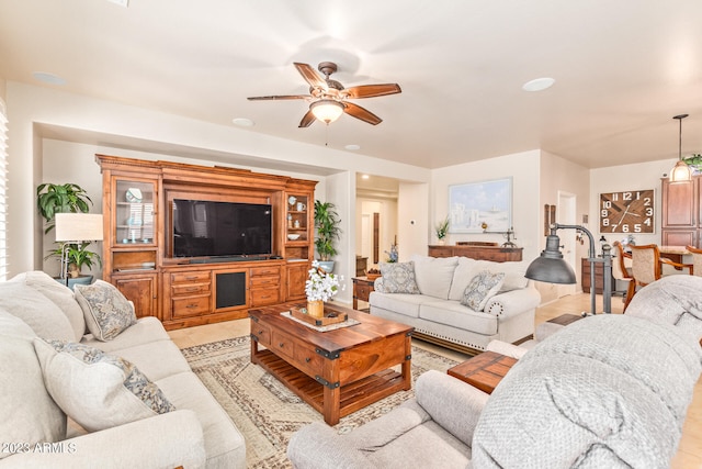 living room featuring ceiling fan