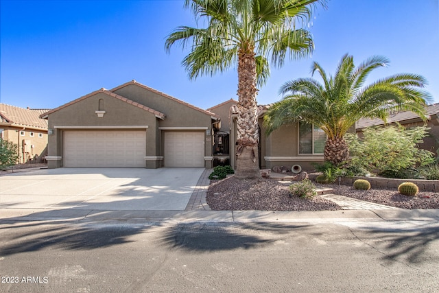 view of front of home with a garage