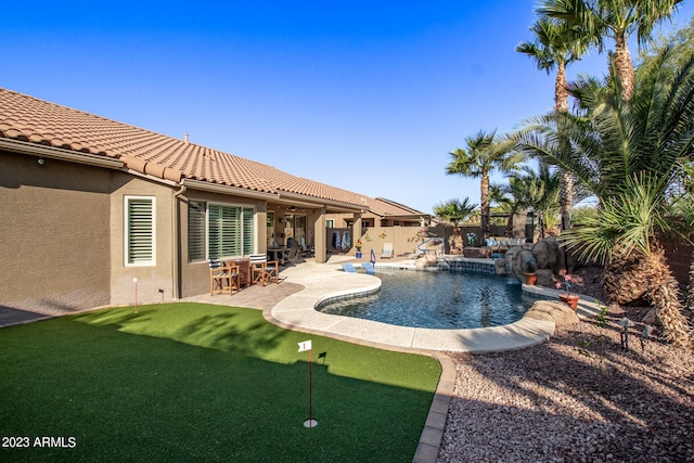 view of pool featuring a patio