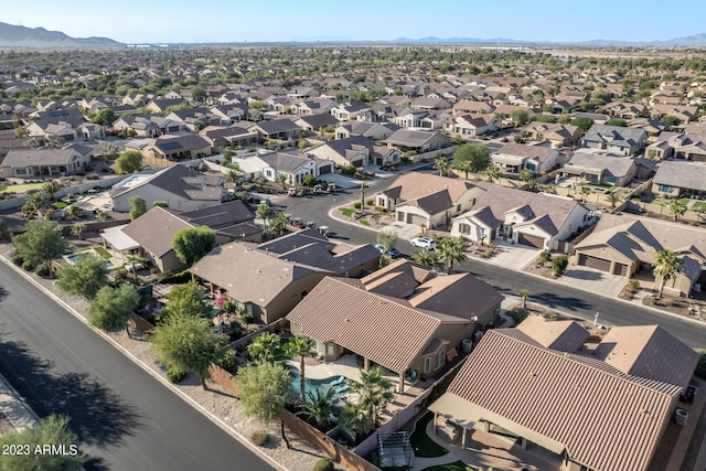 drone / aerial view featuring a mountain view