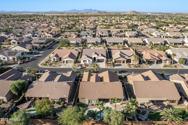 birds eye view of property featuring a mountain view