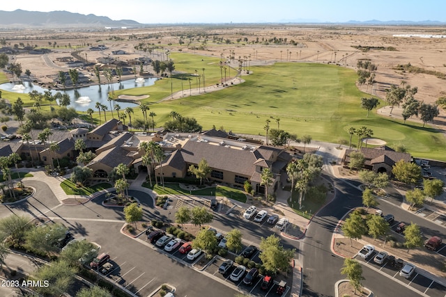 drone / aerial view featuring a water and mountain view