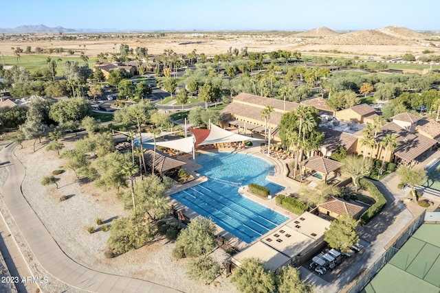 birds eye view of property featuring a mountain view