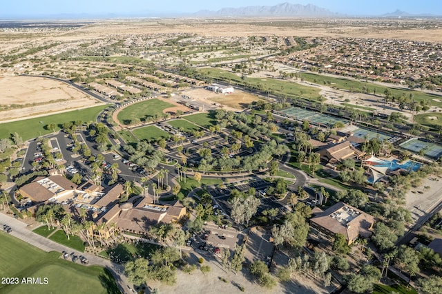 birds eye view of property with a mountain view