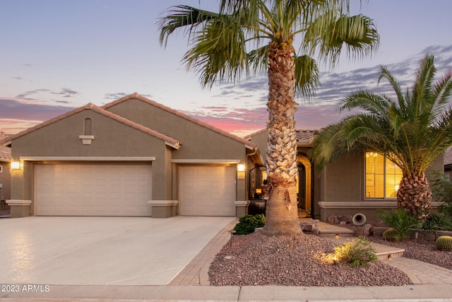 view of front of home with a garage