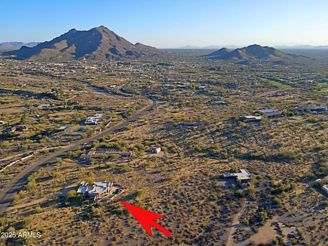 bird's eye view with a mountain view