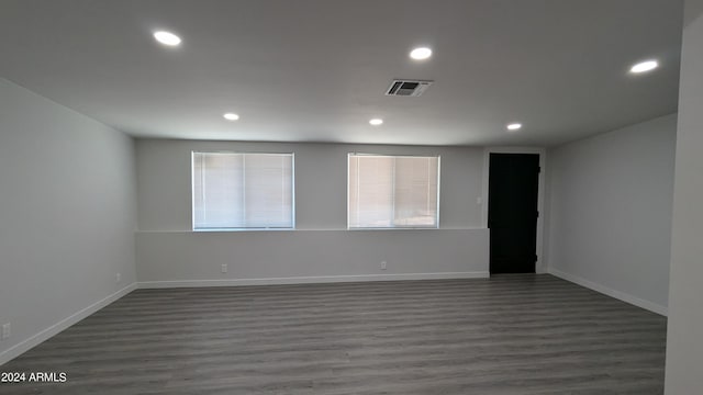 empty room featuring dark hardwood / wood-style floors