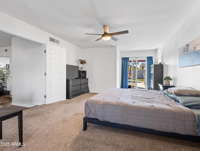 carpeted bedroom featuring ceiling fan