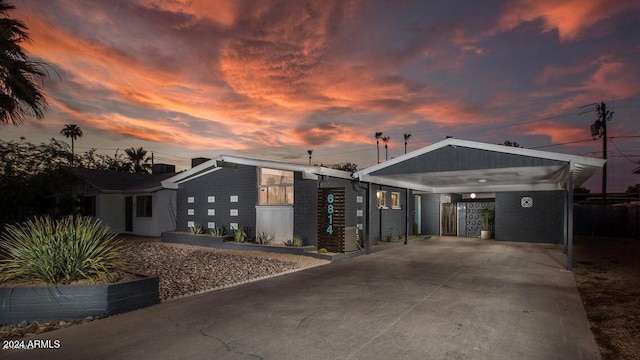 view of front of house featuring a carport