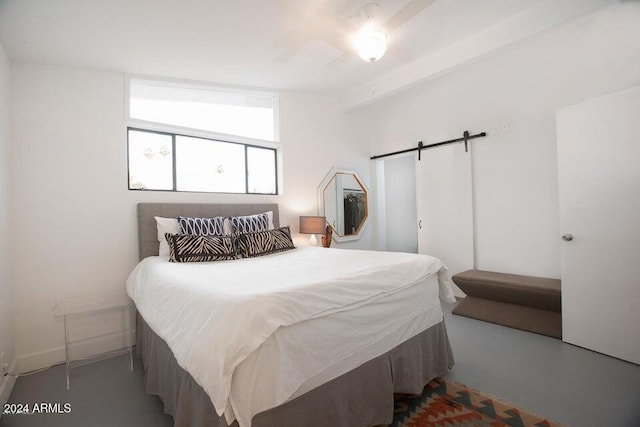 bedroom with a barn door