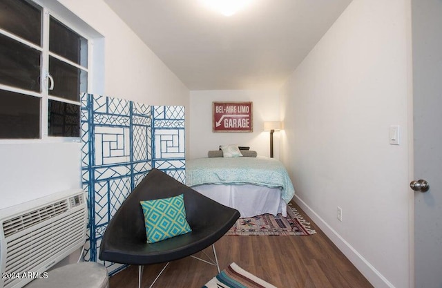 bedroom featuring wood-type flooring