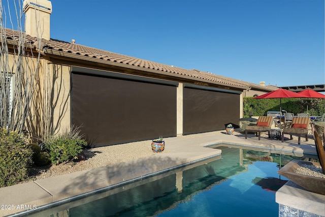 view of pool with a patio area