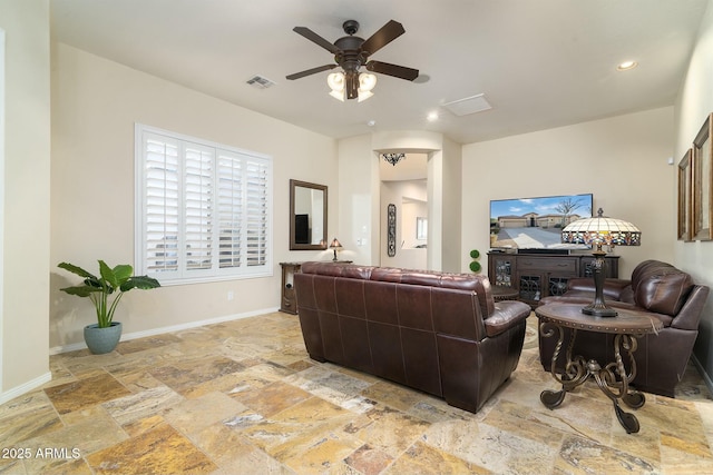 living room featuring ceiling fan