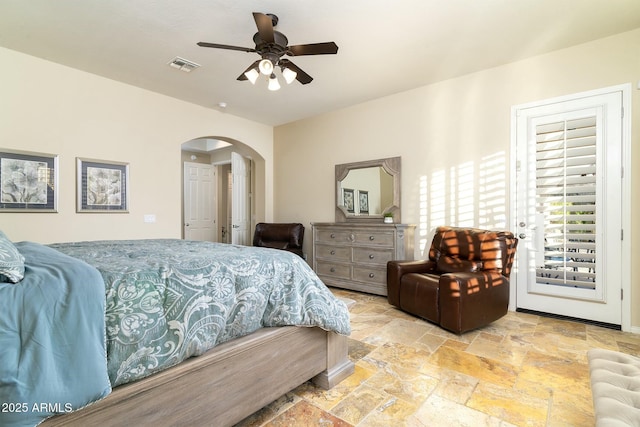 bedroom with ceiling fan and access to outside