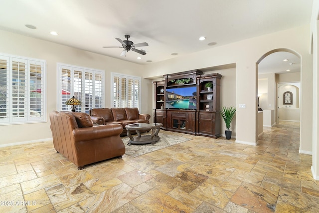 living room with ceiling fan