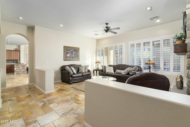 living room with ceiling fan