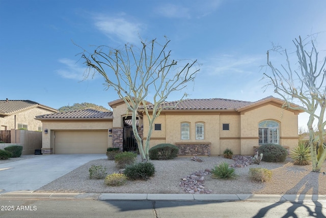 mediterranean / spanish-style house featuring a garage