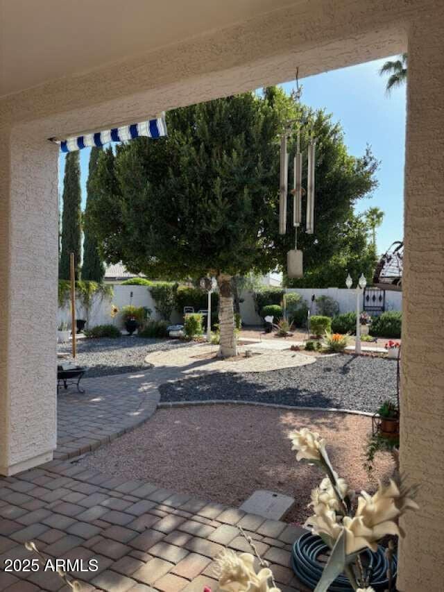 view of patio with a fenced backyard